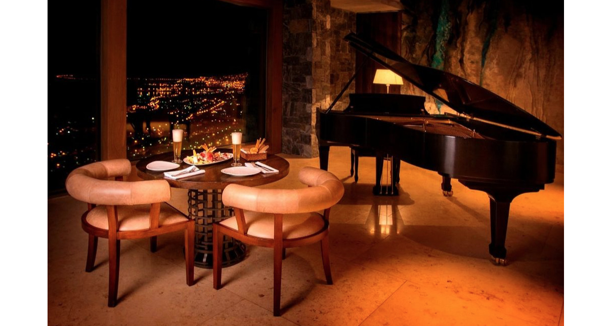 Arakur Ushuaia Resort & Spa piano bar with spectacular views