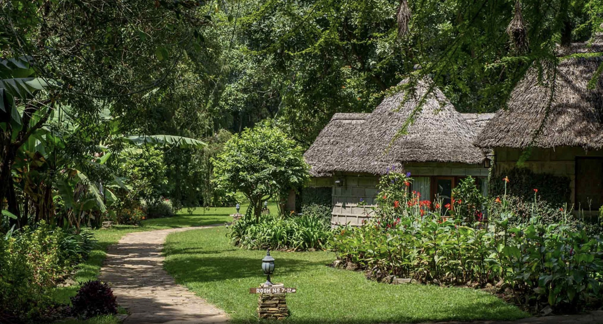 Arusha Serena Hotel courtyard and path to guest cabins