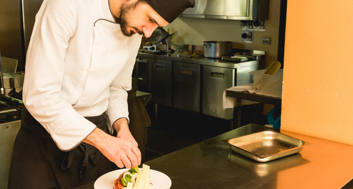 Castello La Leccia chef preparing a meal