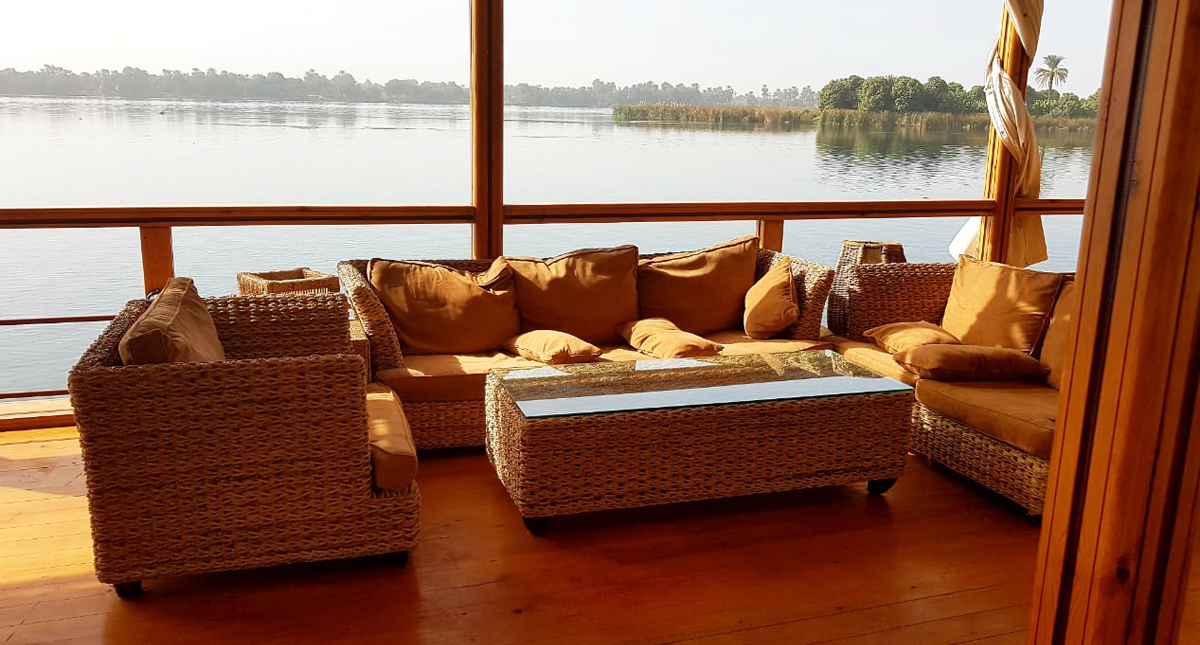 Nile River dahabiya covered sundeck lounge area