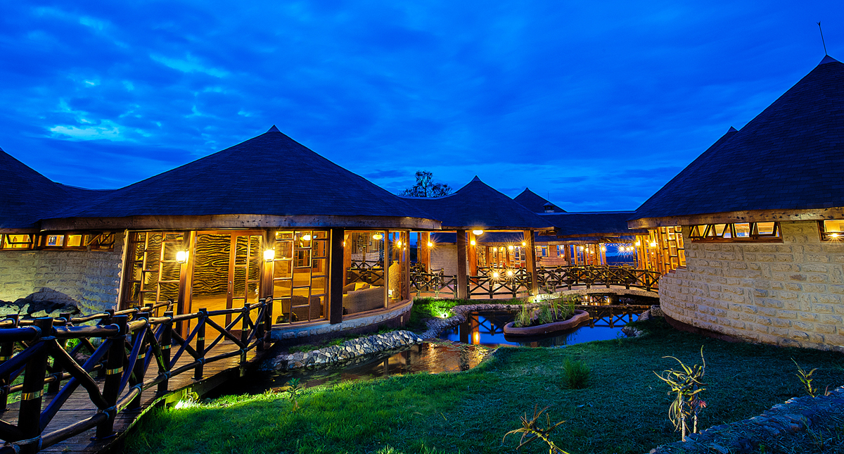 Lake Nakuru Sopa Lodge guest lodges illuminated at night