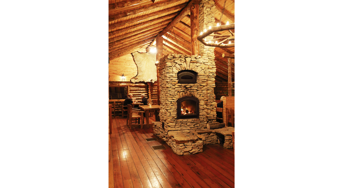 Lazy Bear Lodge dining area with fireplace