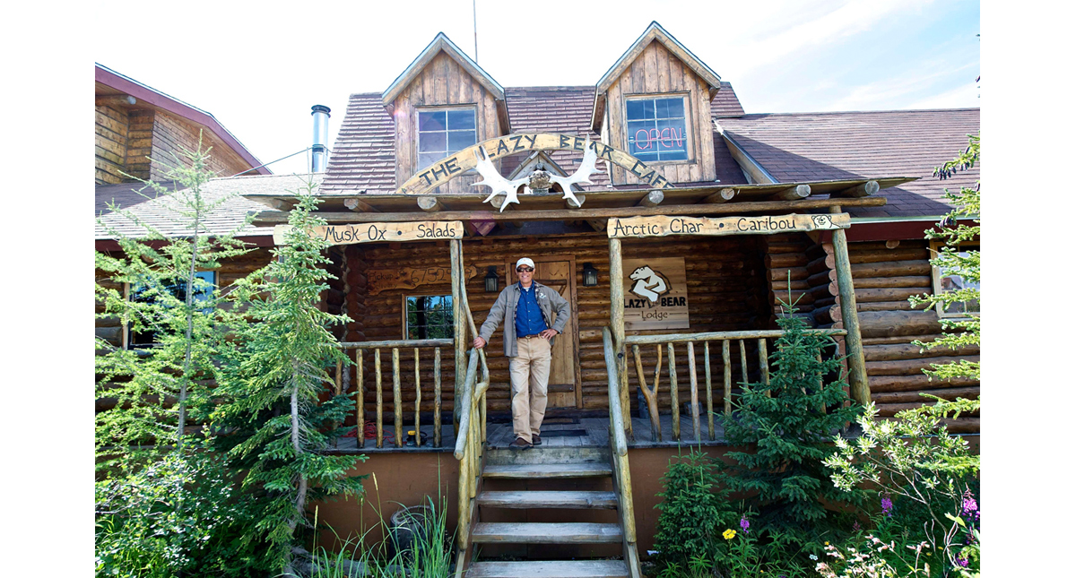 Lazy Bear Lodge exterior with proprietor Wally Daudrich 