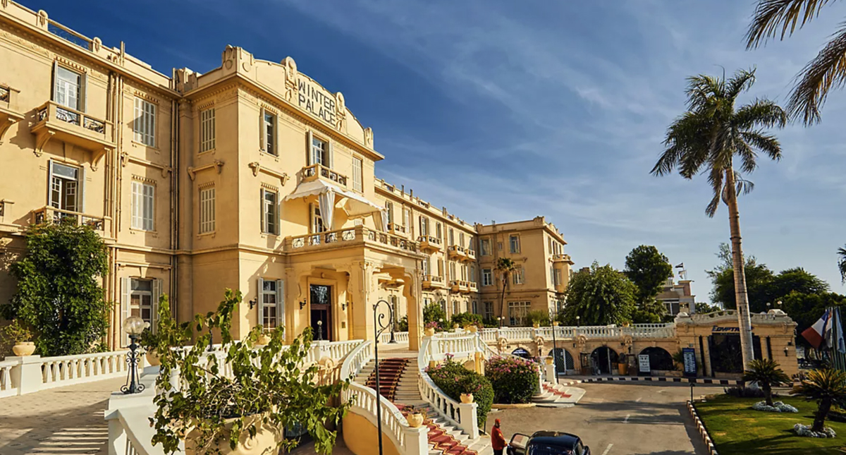 Winter Palace Hotel exterior view with Nile River in foreground