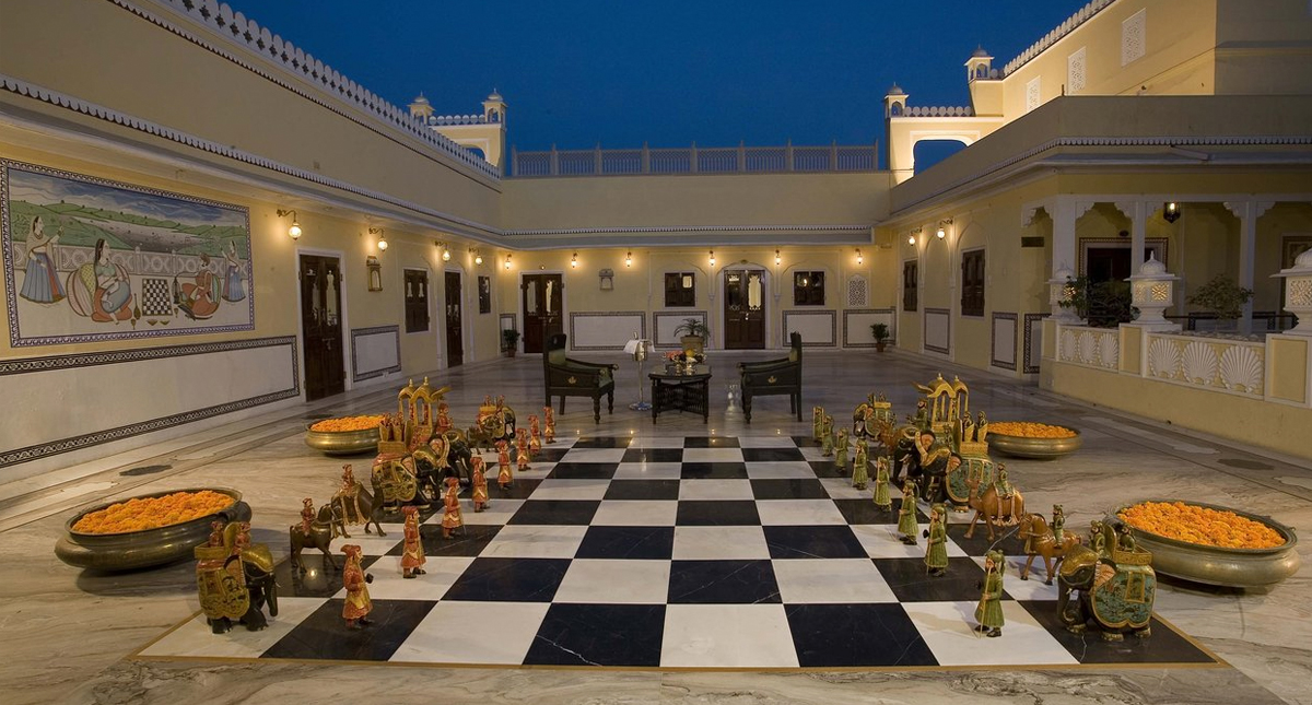 Raj Palace outdoor giant tiled chess board and game pieces