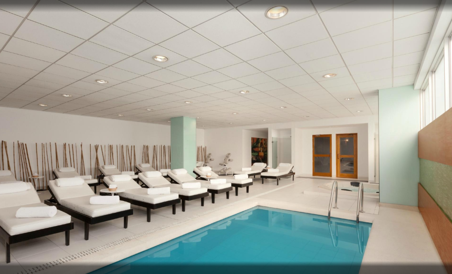 Wyndham Costa del Sol indoor pool with chaise lounge chairs