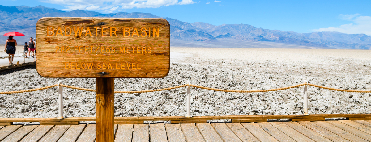 Wooden walk path and sign at Badwater Basin