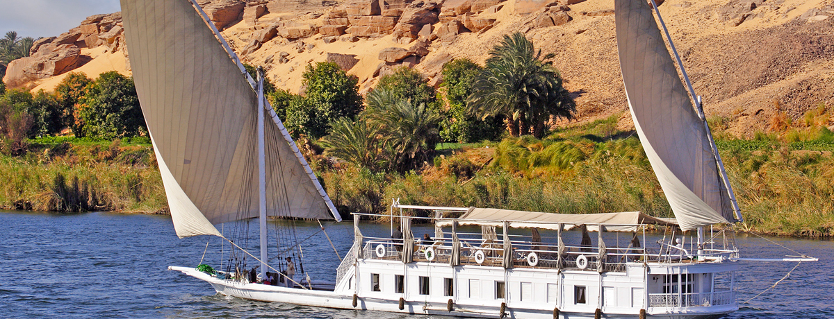 Dahabiya sailing down the Nile River