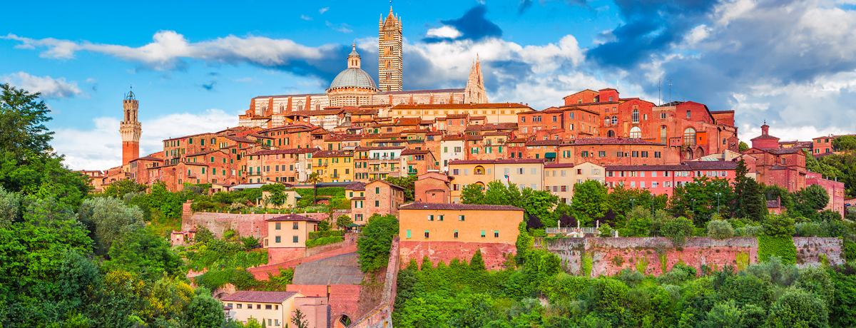 Panorama of medieval Siena with dome of Siena Cathedral and Mangia Tower