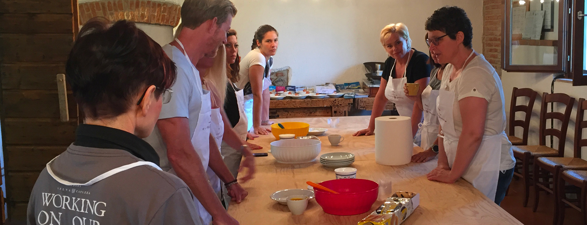 Guests listening to instruction during cooking class