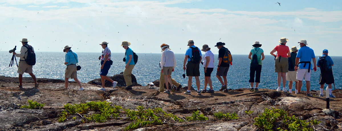 Guests embarking on a hike on land