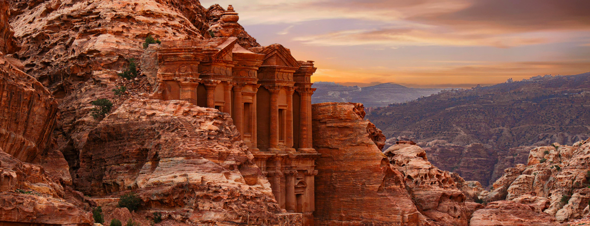 Petra stone landscape under cloudy sky