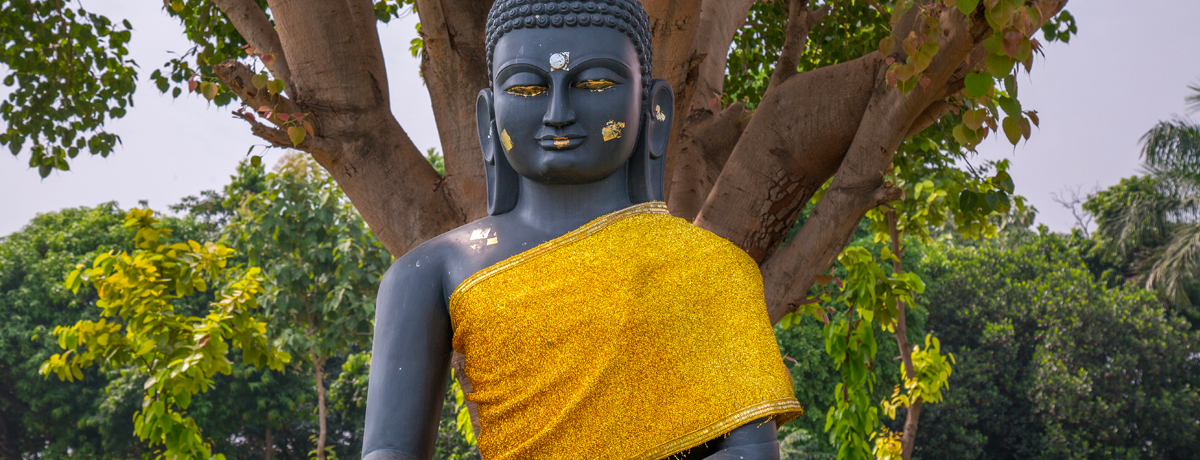 Black granate Gautam Buddha statue in meditation seen at a Buddhist monastery