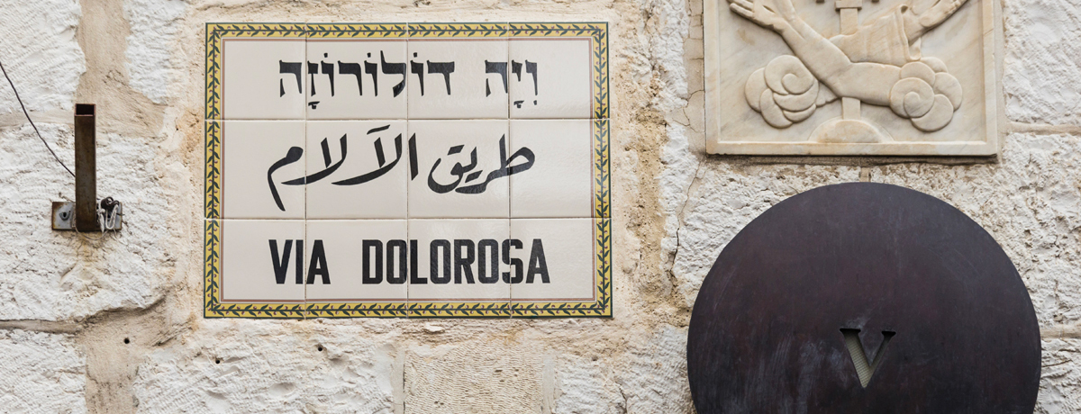 Stone sign that reads the Way of Suffering of Jesus, Via Dolorosa in Jerusalem