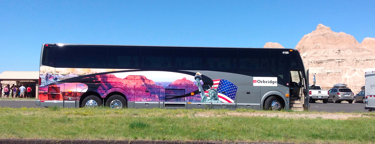 Orbridge coach bus parked during a tour break