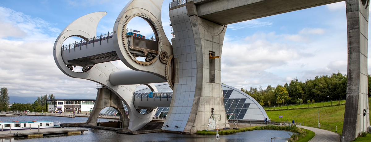 The Falkirk Wheel is a rotating boat lift in Falkirk, Scotland, connecting the Forth and Clyde Canal with the Union Canal