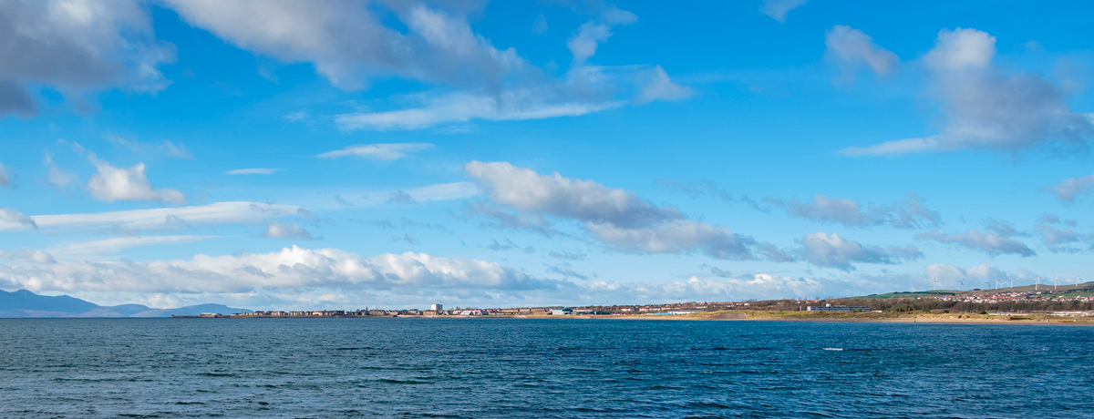 View from Stevenston foreshore to Saltcoats and Ardrossan with the Isle of Arran in the distance
