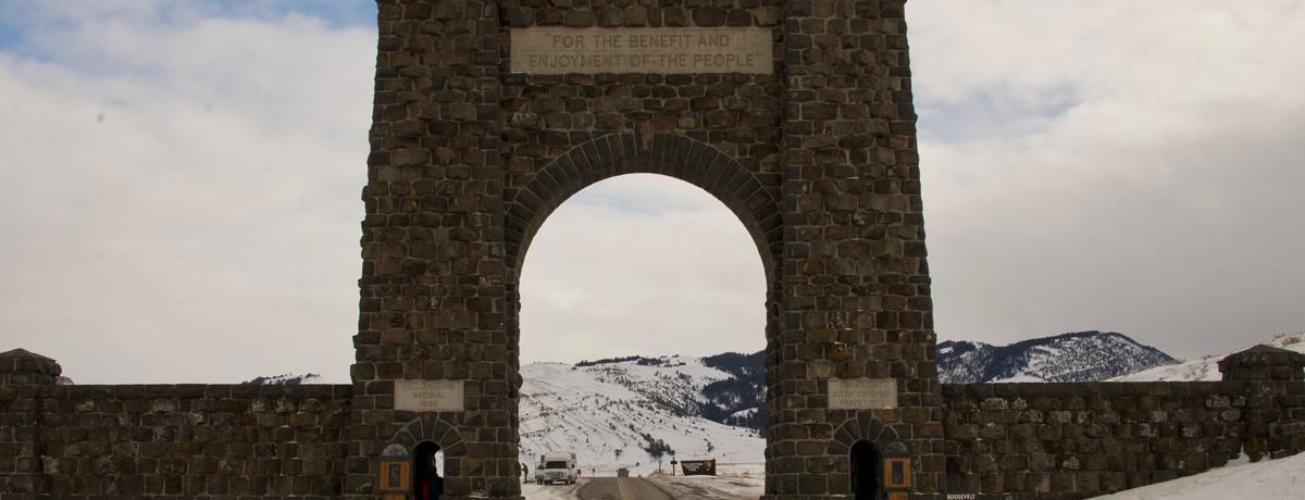 Arched stone entryway to Yellowstone National Park