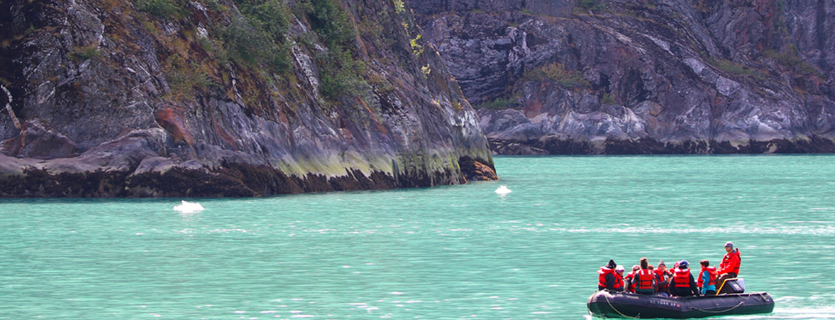 Guests kayaking in Alaska