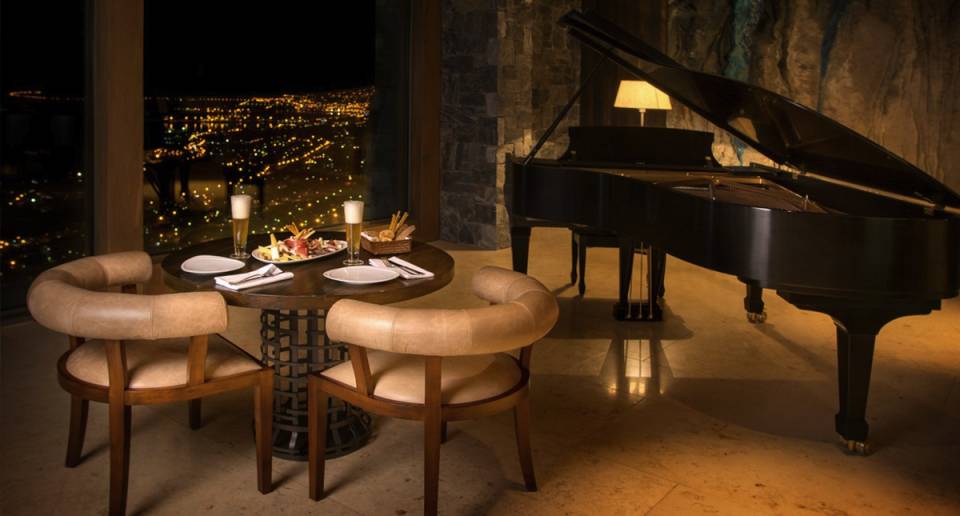 Arakur Ushuaia Resort & Spa piano bar with spectacular views